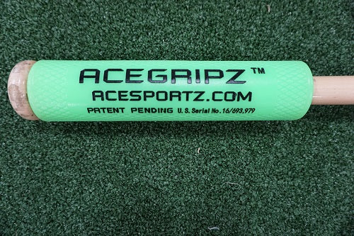 Green ACEGRIPZ wood bat grip fitted on a wood bat handle
