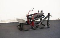 Thumbnail for Black and red plate-loaded hip thruster machine with a padded seat and foot platform.