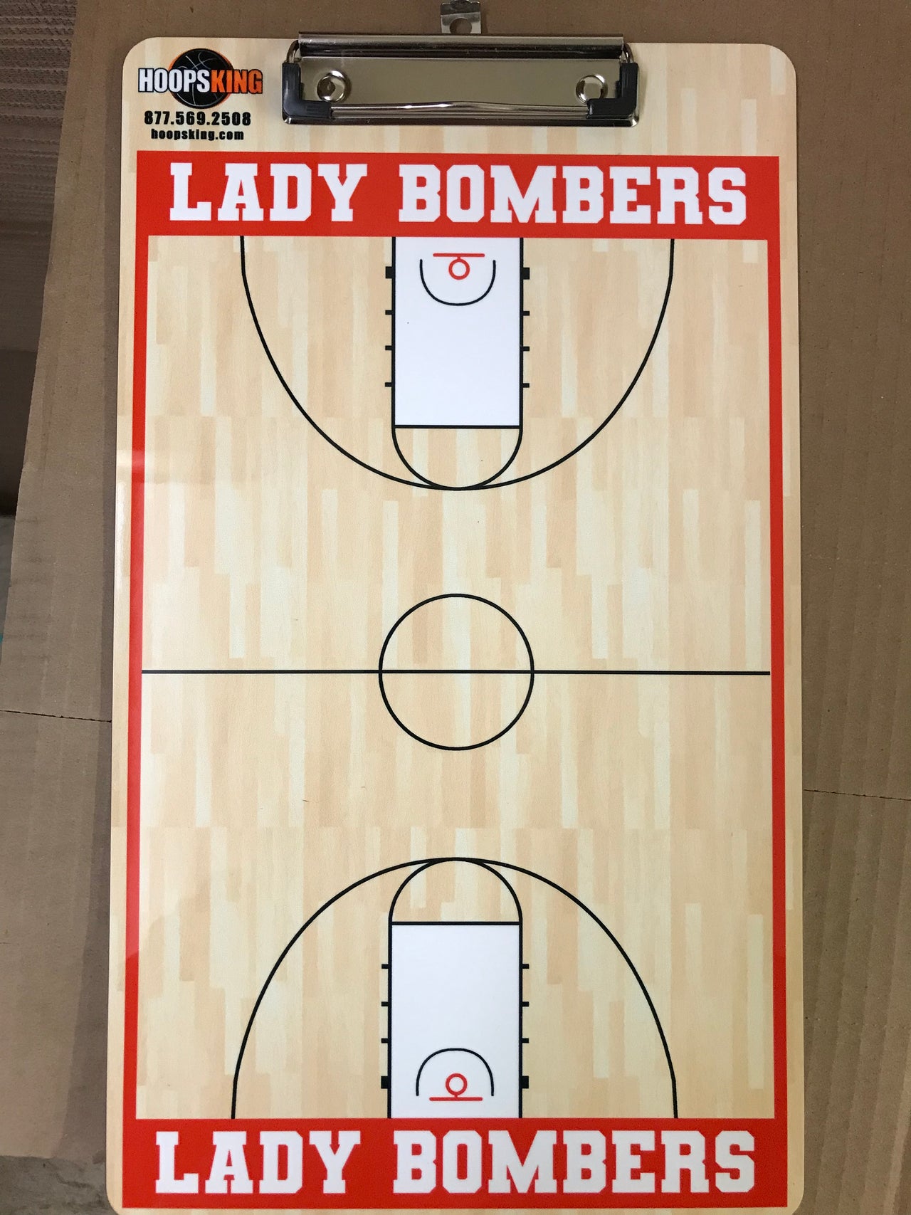 Basketball clipboard with a court diagram, "Lady Bombers" text, and HoopsKing logo.