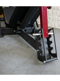 Thumbnail for Close-up of the leg press machine's adjustable back pad and the plate-loaded weight mechanism.