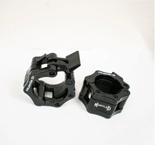 Two black barbell collars with "Muscle D" logo, one open and one closed, on a white background.