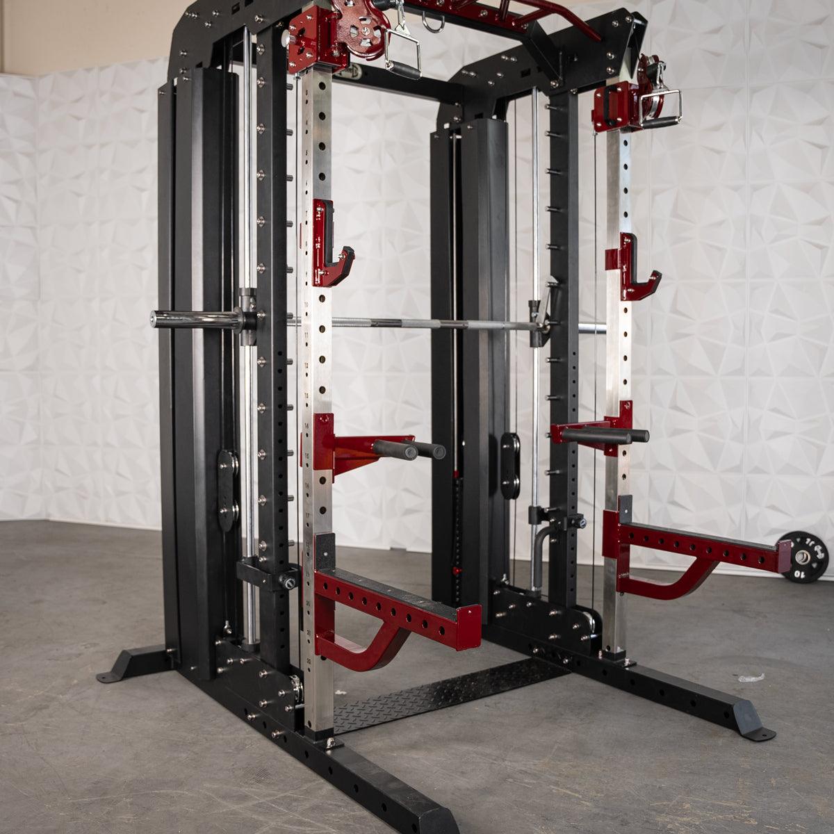 Black and red multi-functional fitness machine with a barbell, safety catches, and pull-up bar.