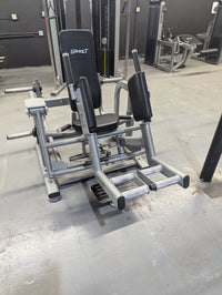 Thumbnail for Black and silver Sweet Glute/Outer Thigh gym machine with padded seat and armrests.