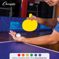 Thumbnail for Person holding a yellow plastic table tennis paddle and a white ball over a blue table.