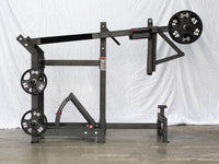 Thumbnail for Plate-loaded pendulum squat machine with weight storage pegs and adjustable foot plate.