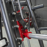 Thumbnail for Close-up of the red and black lever mechanism on the Power Leverage V2 Convergent Bench.