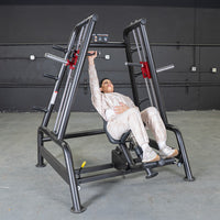 Thumbnail for Woman using a black and red Power Leverage V2 Convergent Bench for an incline shoulder press.