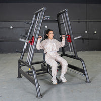 Thumbnail for Woman using a black and red leverage bench press machine in a gym.