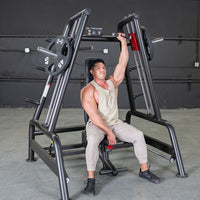 Thumbnail for Man performing a shoulder press on a black Power Leverage V2 Convergent Bench with 45lb plates.