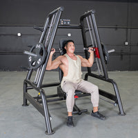 Thumbnail for Man using a black Power Leverage V2 Convergent Bench for incline shoulder press, with 45lb plates loaded.
