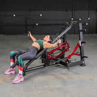 Thumbnail for Woman performing a decline chest fly on a red and black leverage machine in a gym.
