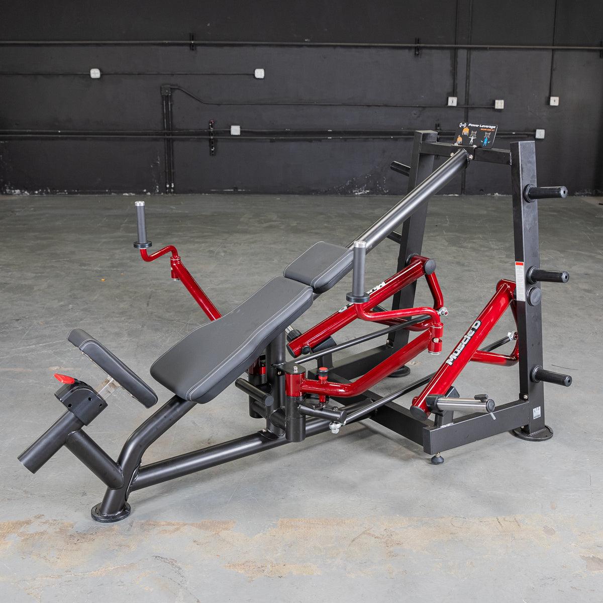 Red and black decline chest fly machine with an adjustable padded bench in a gym setting.