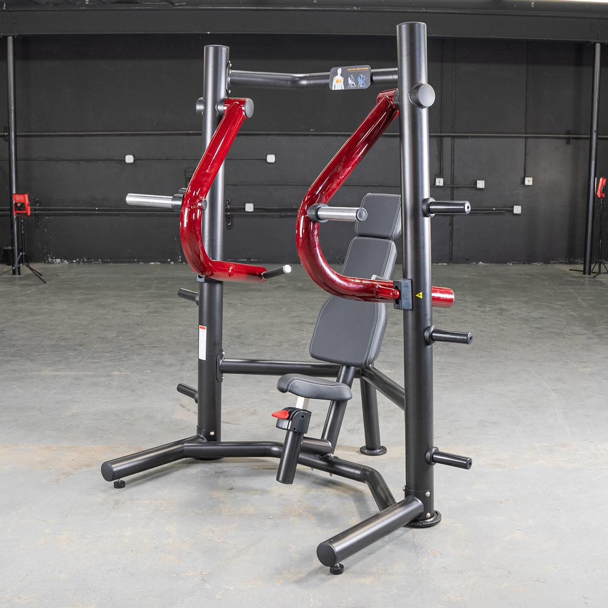 Black and red decline chest press machine with an adjustable seat in a gym.