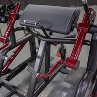 Thumbnail for Red and black biceps curl machine with padded armrest and handles.