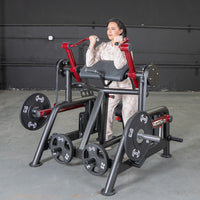 Thumbnail for Woman using a black and red biceps curl machine with weight plates in a gym.