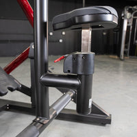 Thumbnail for Close-up of the adjustable black seat and red lever on the Power Leverage V2 Iso Lateral Seated Row machine.