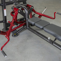 Thumbnail for Red and black lying pec fly machine with an adjustable bench and padded handles.