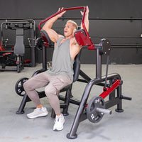 Thumbnail for Man using a red and black Power Leverage V2 Pullover machine in a gym.