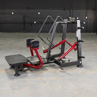 Thumbnail for Red and black standing abductor machine in a gym.