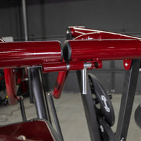 Thumbnail for Close-up of the red Viking Press machine's adjustable pin mechanism.