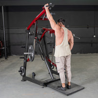 Thumbnail for Man using a red and black Viking press / calf machine in a gym.