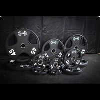 Thumbnail for Black urethane-coated Olympic weight plates in various sizes (45, 35, 25, 10, 5, 2.5 lbs).