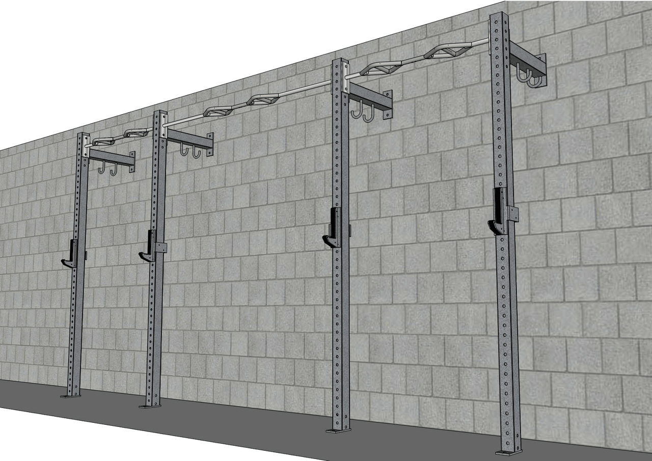 Four gray steel wall-mounted gym rig uprights with pull-up bars and J-hooks against a concrete block wall.