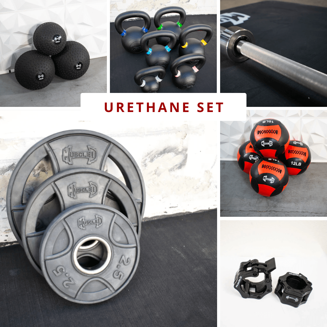 Various gym equipment: weight plates, kettlebells, medicine balls, barbell, and barbell collars.