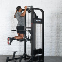 Thumbnail for Man performing an assisted chin-up on a black Excel chin/dip combo machine with a collapsable knee pad.
