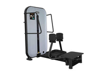 Thumbnail for Gray and black standing abductor machine with a weight stack and padded leg rests.