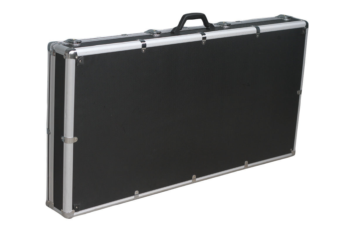 Black rectangular hard case with silver aluminum trim and a black handle on top.