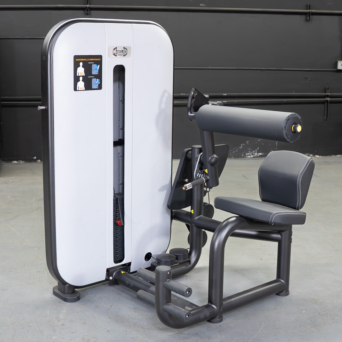 Gray and black adjustable pin selectorized abdominal back workout machine with padded seat and armrest.