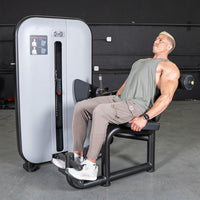 Thumbnail for Man performing an abdominal workout on a gray and black Muscle D Fitness Vogue AB/Back Combo machine.
