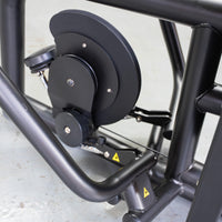 Thumbnail for Close-up of the black pulley and cable system on a low row workout machine.