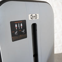 Thumbnail for Close-up of a gray leg extension machine with a 