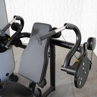 Thumbnail for Close-up of a black triceps extension machine with padded backrest and handles.