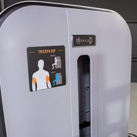 Thumbnail for Close-up of a gray triceps dip machine with a Muscle D Fitness logo and exercise instruction sticker.