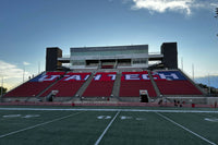 Thumbnail for Custom stadium seat covers with Utah Tech branding installed on arena seating sections