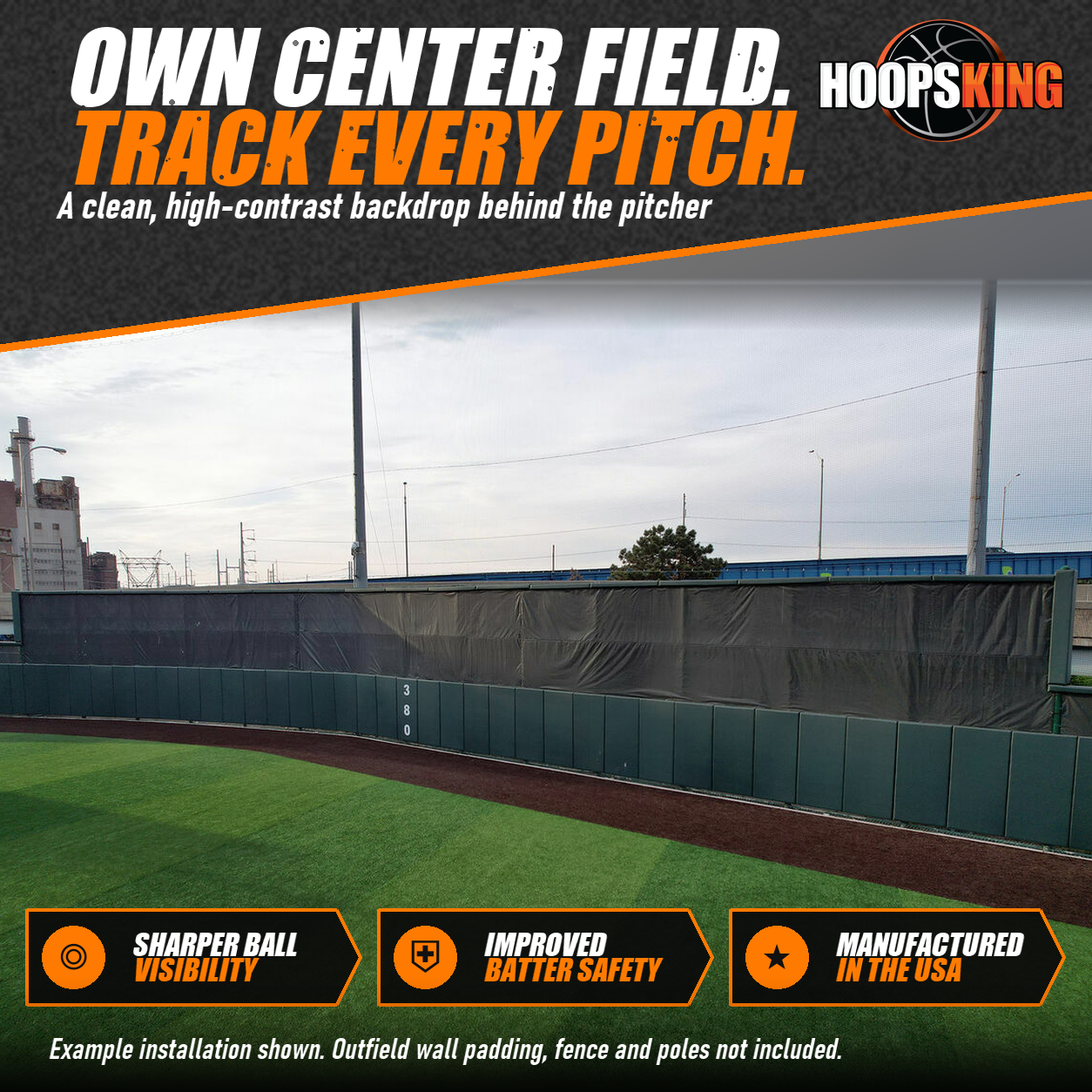 Dark green FenceMate batter's eye screen across the top of a curved outfield wall above green wall padding