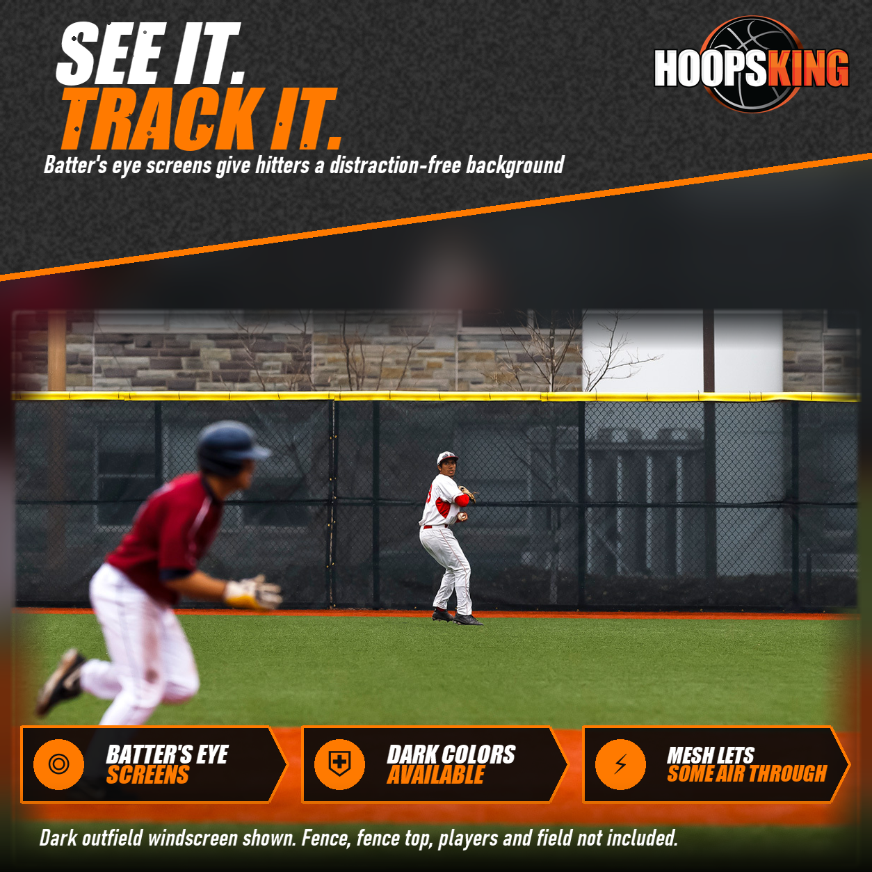 Dark mesh windscreen with a yellow fence top behind an outfielder throwing on a turf baseball field