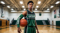 Thumbnail for Basketball player in a green Gators uniform wearing a matching custom arm sleeve
