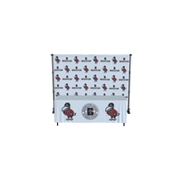 Thumbnail for Custom backdrop and table cover with Benedictine College logo and raven mascot.