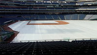 Thumbnail for Citizens Bank Park stadium interior showing a CoverSports growth cover deployed across the outfield and infield turf of the Philadelphia Phillies MLB field, with the clay infield and pitcher's mound left exposed and empty blue seating visible in the background