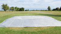 Thumbnail for IeldSaver golf course cover from CoverSports protecting a rectangular tee box at a golf course, showing how polypropylene covers shield greens and tee boxes from winter weather