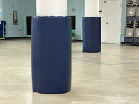 Thumbnail for Navy column padding wrapped around two round support columns in a school multipurpose room