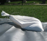 Thumbnail for Sandbag secures FieldSaver field tarp