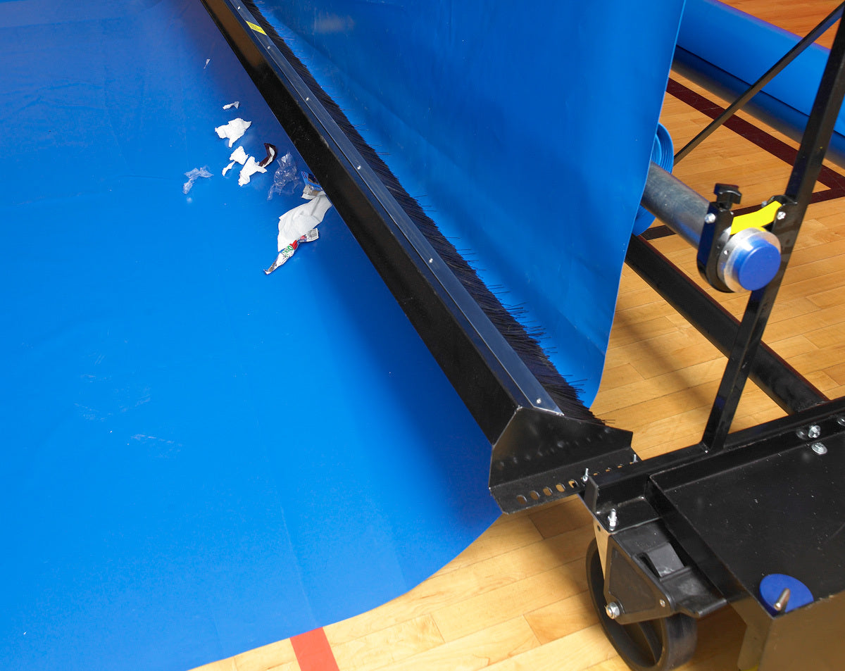 Optional brush assembly for gym floor cover rack