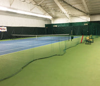Thumbnail for Indoor tennis divider netting separates two courts