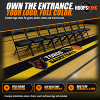 Thumbnail for Black and yellow logo mat reading TOROS BASKETBALL with a red bull mascot beside a row of black folding chairs on a gym floor