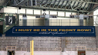 Thumbnail for Custom printed stadium seat covers in navy blue with gold text covering bleacher sections at American Family Field